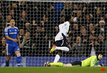 terry helps chelsea protect draw at tottenham