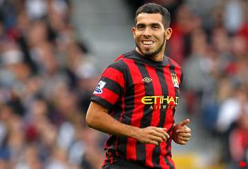tevez could play for man city in 2 weeks says mancini