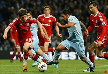 tevez scores as city thrashes west brom 4 0