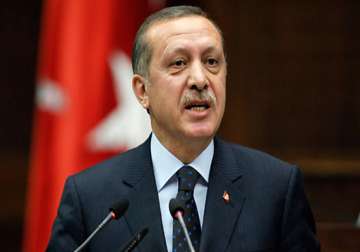turkish pm defends decision to clear clubs