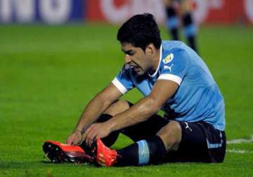 uruguay keeps hopes alive beating colombia 2 0