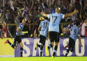 wc qualifier uruguay edge closer to world cup berth
