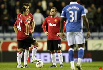 wigan inflicts shock 1 0 loss on man united