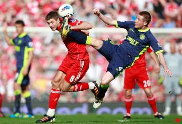 wigan upsets liverpool 2 1 to boost survival hopes