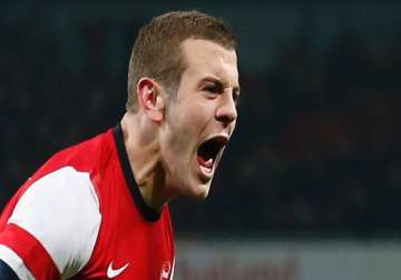 wilshere accepts charge for offensive gesture