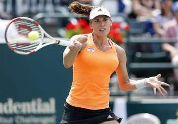 andrea petkovic rallies past eugenie bouchard in 3 sets at family circle