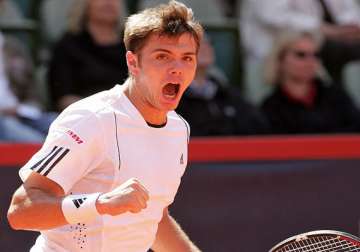 australian open wawrinka advances to 2nd round