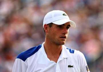 australian open isner out due to foot injury