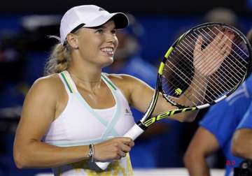 australian open caroline wozniacki advances to 3rd round