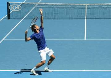 australian open federer notches straight sets win over tomic