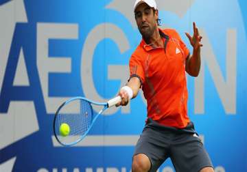 baghdatis wins in first round at eastbourne
