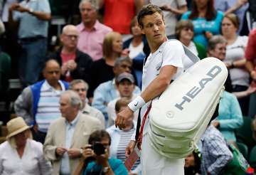 berdych loses to gulbis in 1st round of wimbledon