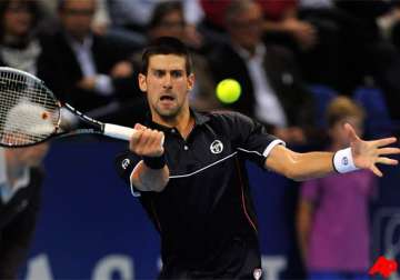 djokovic and federer through to swiss indoors semis