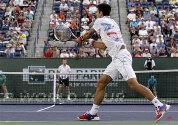 djokovic earns victory over qualifier
