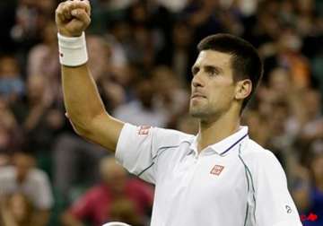 djokovic beats harrison under wimbledon lights