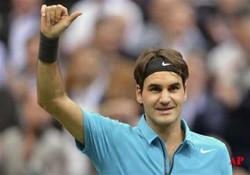 federer ousts de bakker at abn amro