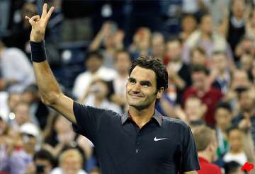 federer arrives in australia for davis cup playoff