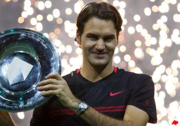 federer beats del potro to clinch abn amro title