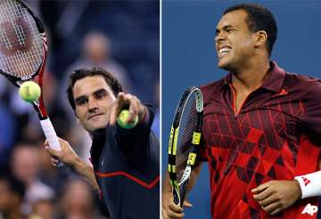 federer beats tsonga to cap chaotic day at open