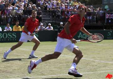 federer wawrinka fall to australia in davis cup doubles