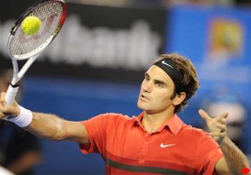 federer wins opener at australian open