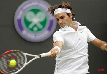 federer brushes aside ramos at wimbledon