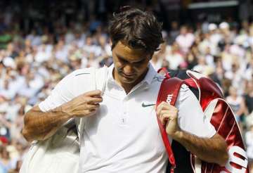 federer loses to tsonga in wimbledon quarterfinals