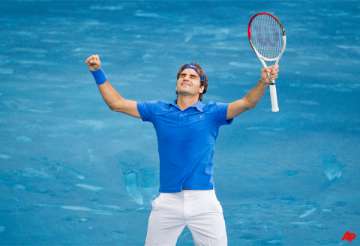 federer rallies to beat berdych in madrid final