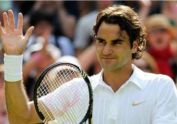 federer reaches another milestone at french open