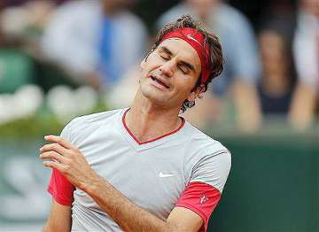 french open roger federer loses to ernests gulbis in 4th round