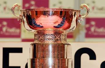 us to play belgium italy to play australia in fed cup