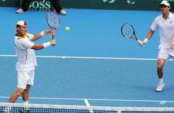 australia leads belgium 2 1 in davis cup