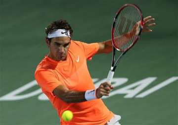 roger federer rallies to reach dubai quarters novak djokovic through