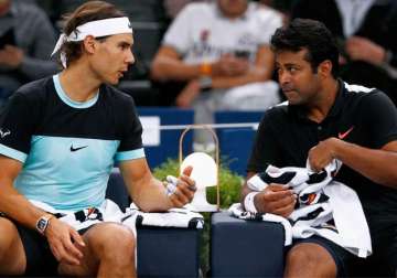 paes nadal pair ousted from paris masters