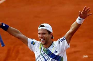 melzer upsets djokovic gets nadal next