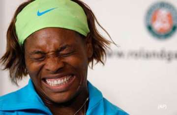 serena williams to top rankings in singles doubles