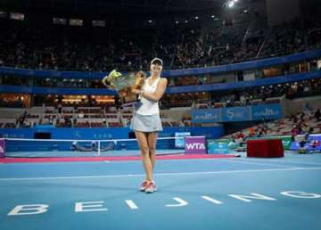 sharapova wins china open back to world number 2