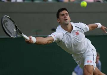 wimbledon 2015 novak djokovic kevin anderson match suspended after four sets play to resume today