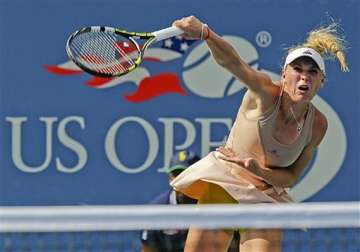 us open wozniacki wins semi when peng shuai retires