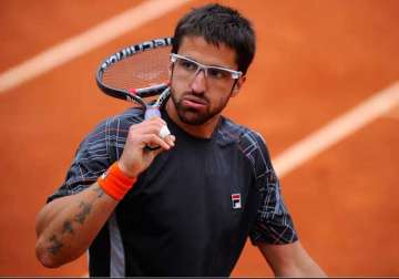 injured tipsarevic pulls out of chennai open