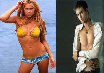 is tennis beauty anna kournikova splitting with singer enrique