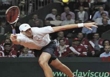 isner beats tomic to reach delray beach semis