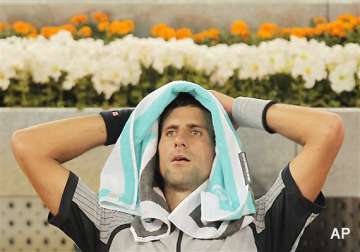 madrid masters djokovic knocked out of