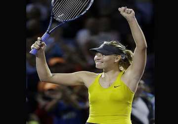 maria sharapova advances at sony open.