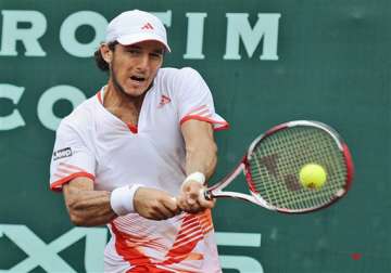 monaco beats isner in houston final