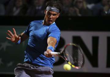 nadal holds off strong murray challenge in rome