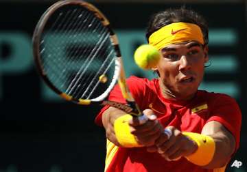 nadal beats tsonga to lead spain into dcup final