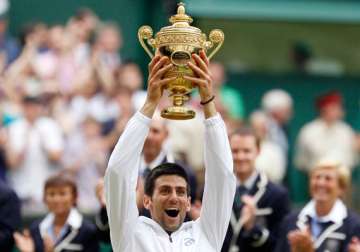 nadal s reign ends djokovic wins his first wimbledon title
