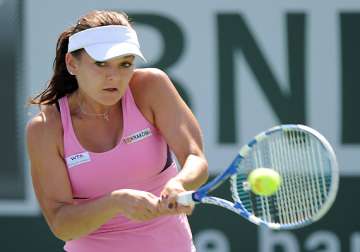 radwanska reaches quarterfinals in dubai