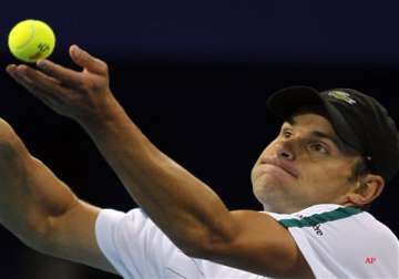 roddick out wozniacki wins at china open